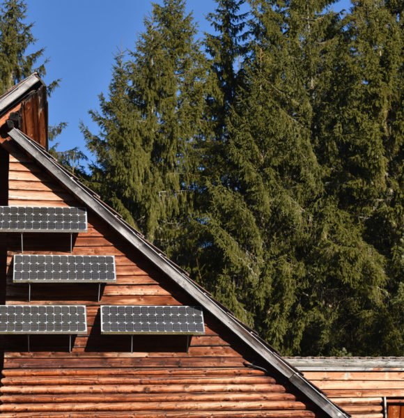 Solar panel on a wooden house